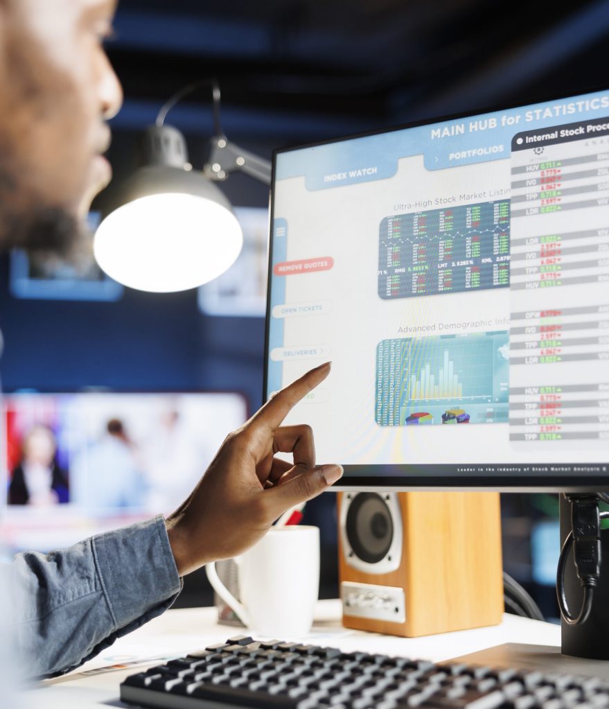 Analyst completing monthly income balance on computer, estimating expenses and investment in capital to boost earnings. Professional researcher investigates legal commerce figures and reports.